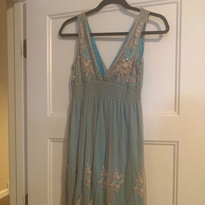 Turquoise dress with gold overlay